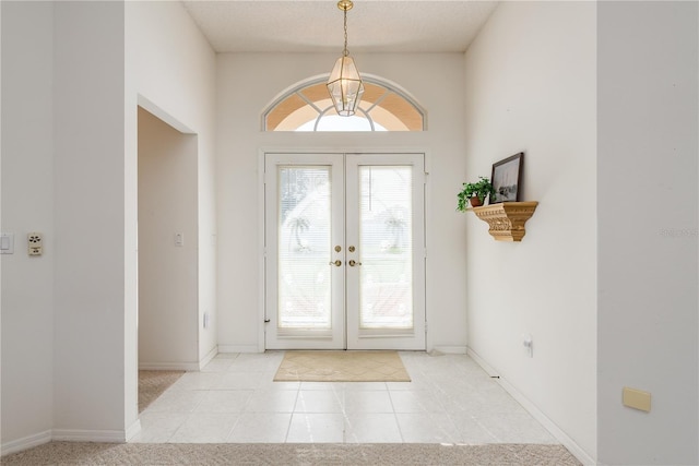 5423 Abagail Dr, Spring Hill, FL 34608 - entryway with french doors and light tile patterned flooring