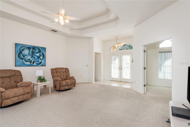 5423 Abagail Dr, Spring Hill, FL 34608 - living area with french doors, carpet floors, and plenty of natural light