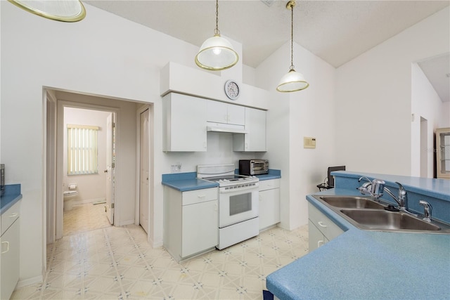 5423 Abagail Dr, Spring Hill, FL 34608 - kitchen featuring white electric stove, light flooring, white cabinets, under cabinet range hood, and high vaulted ceiling