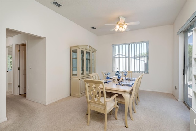 5423 Abagail Dr, Spring Hill, FL 34608 - dining room with light carpet and a ceiling fan