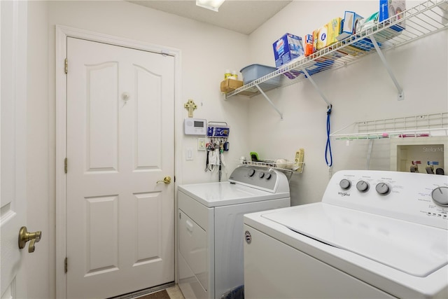 5423 Abagail Dr, Spring Hill, FL 34608 - laundry room with separate washer and dryer