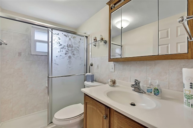 12637 2nd Isle, Hudson, FL 34667 - full bath with a stall shower, toilet, vanity, and backsplash