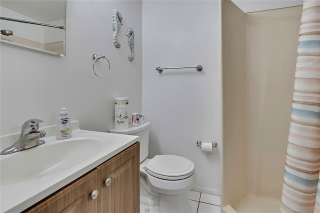 12637 2nd Isle, Hudson, FL 34667 - full bath with a shower with curtain, toilet, tile patterned flooring, and vanity