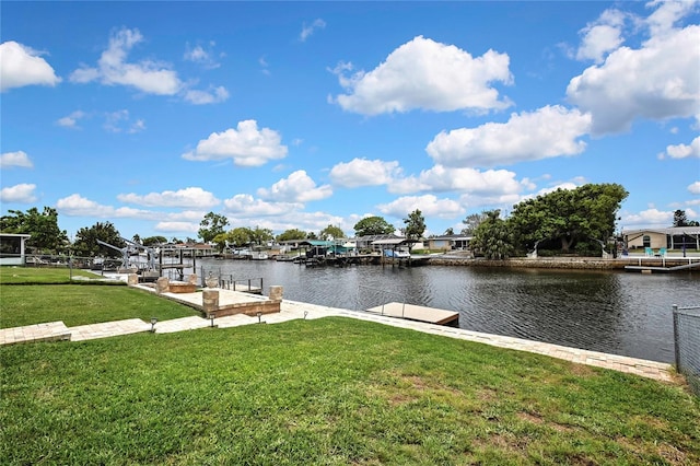 12637 2nd Isle, Hudson, FL 34667 - dock with a water view and a lawn