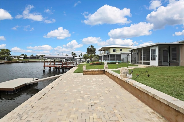 12637 2nd Isle, Hudson, FL 34667 - dock area featuring a water view and a yard