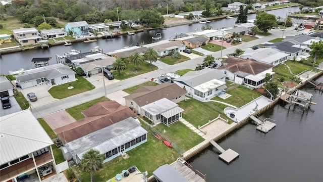 12637 2nd Isle, Hudson, FL 34667 - aerial perspective of suburban area with a large body of water
