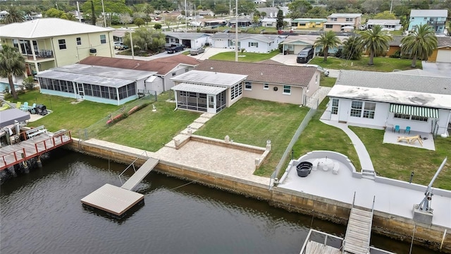 12637 2nd Isle, Hudson, FL 34667 - aerial perspective of suburban area with a large body of water