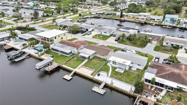 12637 2nd Isle, Hudson, FL 34667 - aerial perspective of suburban area with a nearby body of water