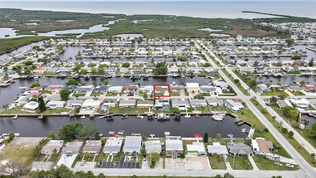 12637 2nd Isle, Hudson, FL 34667 - aerial overview of property's location featuring a nearby body of water and nearby suburban area