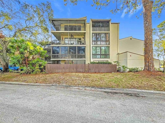 700 Starkey Rd Unit 622, Largo, FL 33771 - view of front of house with a balcony and stucco siding