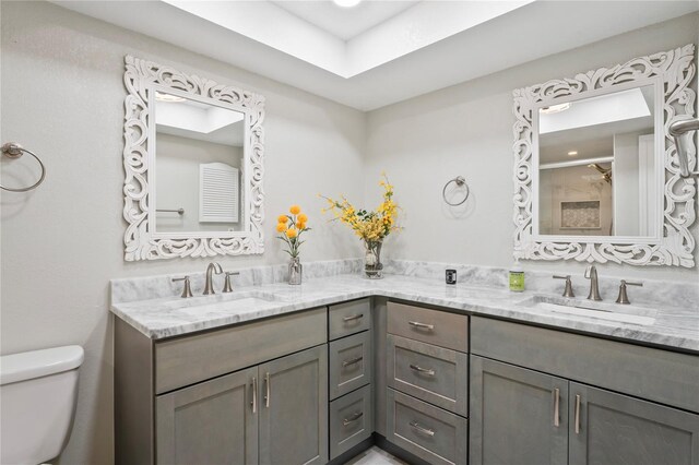 9622 Brassie Ct Unit 9, New Port Richey, FL 34655 - full bathroom with double vanity, toilet, and a shower