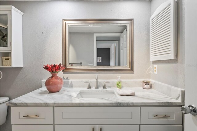9622 Brassie Ct Unit 9, New Port Richey, FL 34655 - bathroom with vanity and toilet