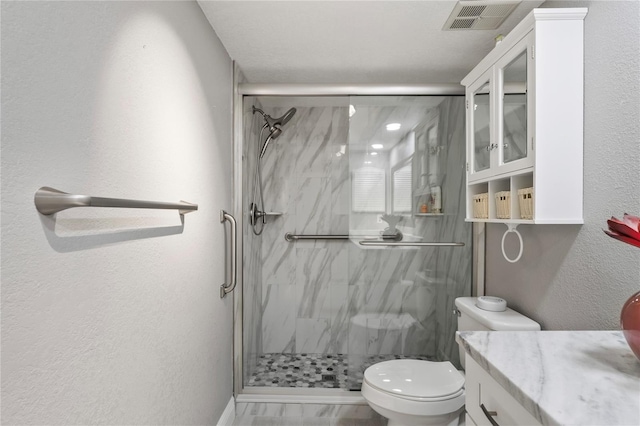 9622 Brassie Ct Unit 9, New Port Richey, FL 34655 - bathroom with toilet, a marble finish shower, and vanity