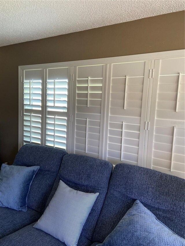 9622 Brassie Ct Unit 9, New Port Richey, FL 34655 - bedroom view of a textured ceiling