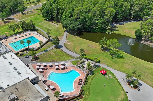 9622 Brassie Ct Unit 9, New Port Richey, FL 34655 - drone / aerial view of a pool area and a large body of water