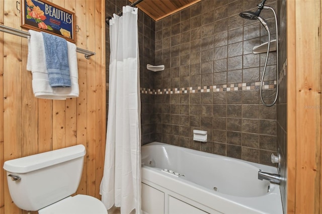 10301 Nina Ct, New Port Richey, FL 34654 - full bathroom featuring toilet, a combined bath / shower with jetted tub, and wooden walls