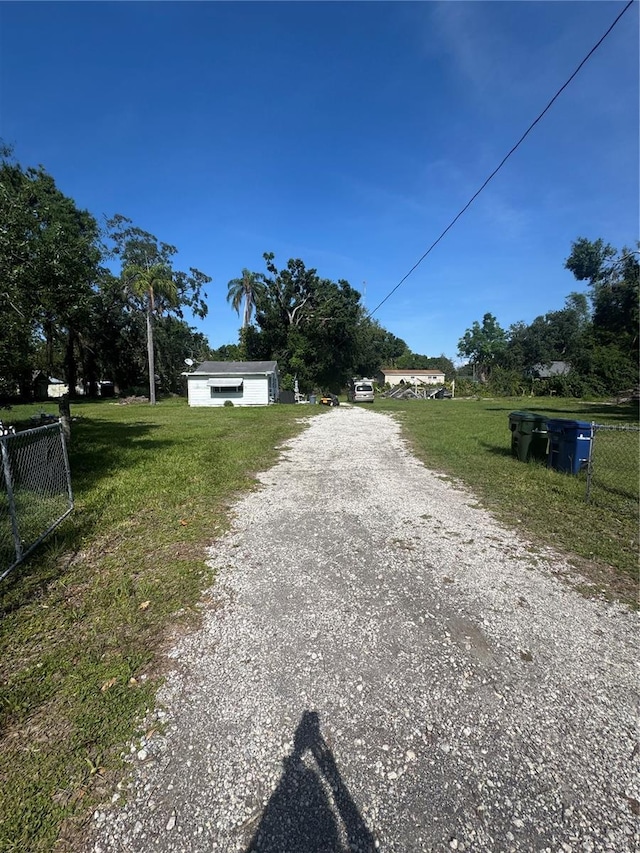 410 Houle Ave, Sarasota, FL 34232 - view of dirt / gravel driveway
