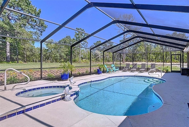 9152 Bunting Rd, Weeki Wachee, FL 34613 - view of swimming pool with a patio, a pool with connected hot tub, and a lanai