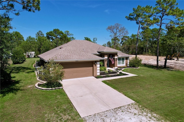 9152 Bunting Rd, Weeki Wachee, FL 34613 - single story home with driveway, an attached garage, a front lawn, and a shingled roof