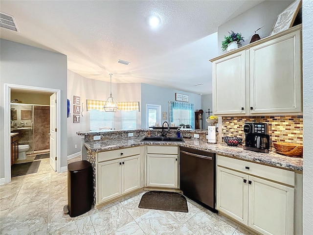 9152 Bunting Rd, Weeki Wachee, FL 34613 - kitchen featuring dishwasher, a sink, a peninsula, light stone countertops, and tasteful backsplash