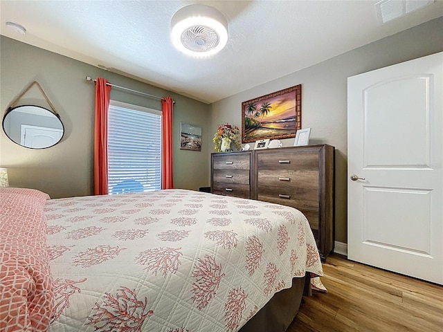9152 Bunting Rd, Weeki Wachee, FL 34613 - bedroom with wood finished floors