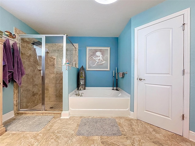 9152 Bunting Rd, Weeki Wachee, FL 34613 - full bathroom with a garden tub, a stall shower, and baseboards