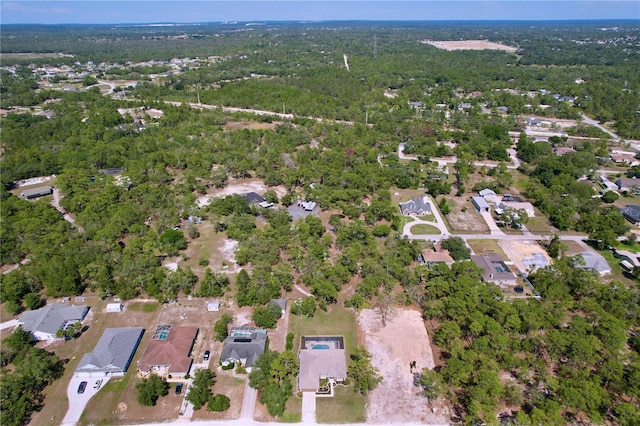 9152 Bunting Rd, Weeki Wachee, FL 34613 - aerial view of property's location with a heavily wooded area