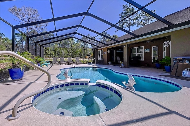 9152 Bunting Rd, Weeki Wachee, FL 34613 - view of swimming pool with a pool with connected hot tub, a patio, and a lanai