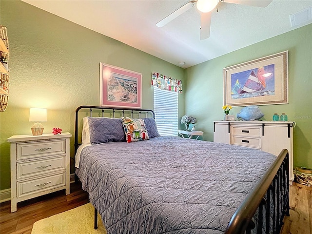 9152 Bunting Rd, Weeki Wachee, FL 34613 - bedroom featuring wood finished floors and ceiling fan