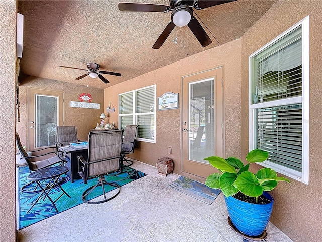 9152 Bunting Rd, Weeki Wachee, FL 34613 - view of patio with a ceiling fan and outdoor dining area