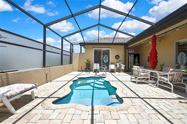 10155 Duffy Cir, Weeki Wachee, FL 34613 - outdoor pool featuring a patio and a lanai