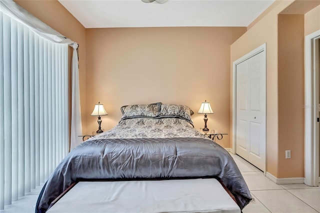 10155 Duffy Cir, Weeki Wachee, FL 34613 - bedroom with tile patterned flooring and baseboards
