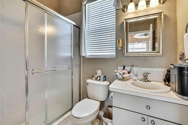 10155 Duffy Cir, Weeki Wachee, FL 34613 - full bathroom with toilet, vanity, and a stall shower