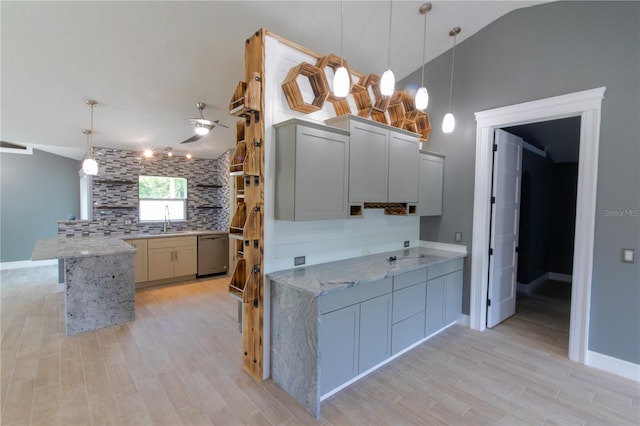 6172 Raleigh St, Spring Hill, FL 34606 - kitchen featuring dishwasher, light wood finished floors, a ceiling fan, a peninsula, and lofted ceiling