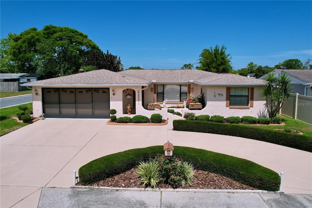 10111 Glen Moor Ln, Port Richey, FL 34668 - single story home featuring curved driveway, stucco siding, and an attached garage