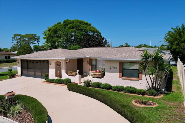 10111 Glen Moor Ln, Port Richey, FL 34668 - single story home with a garage, stucco siding, driveway, and a shingled roof
