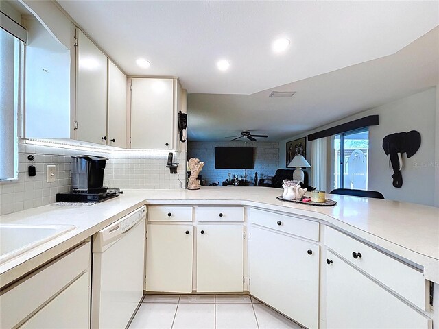 10111 Glen Moor Ln, Port Richey, FL 34668 - kitchen featuring white dishwasher, a ceiling fan, decorative backsplash, light countertops, and recessed lighting