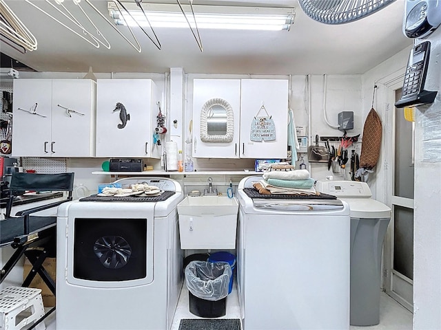 10111 Glen Moor Ln, Port Richey, FL 34668 - washroom featuring washer / dryer and cabinet space