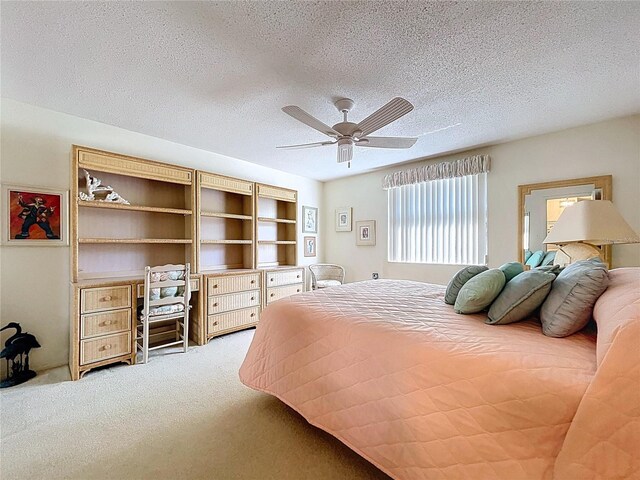 10111 Glen Moor Ln, Port Richey, FL 34668 - bedroom with carpet floors, a textured ceiling, and ceiling fan