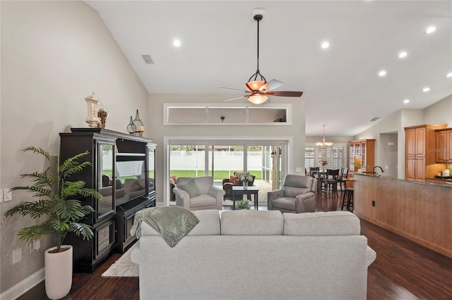 4923 Fort Peck Rd, New Port Richey, FL 34655 - living room with vaulted ceiling, ceiling fan, dark wood-type flooring, and recessed lighting