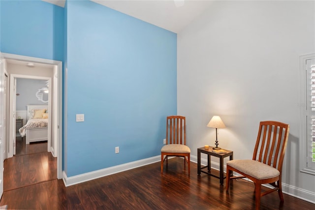 4923 Fort Peck Rd, New Port Richey, FL 34655 - living area featuring wood finished floors and vaulted ceiling