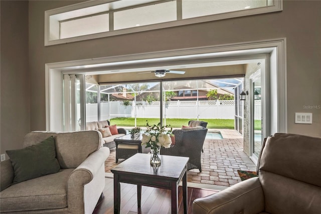 4923 Fort Peck Rd, New Port Richey, FL 34655 - living room featuring a sunroom and a ceiling fan