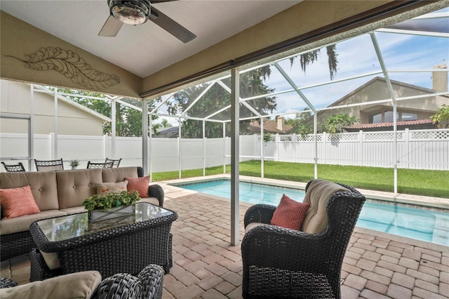 4923 Fort Peck Rd, New Port Richey, FL 34655 - view of swimming pool with a fenced backyard, outdoor lounge area, a patio, ceiling fan, and a lanai