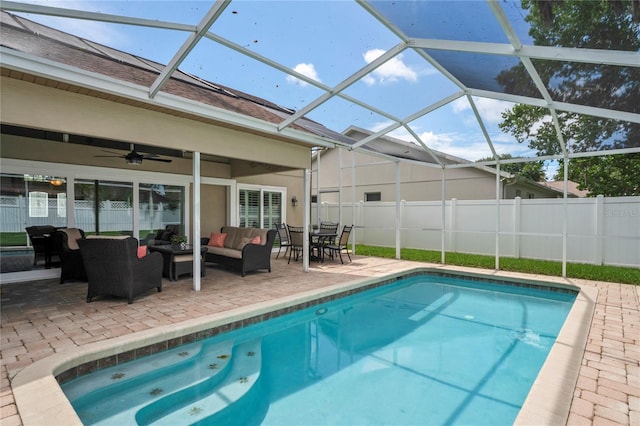 4923 Fort Peck Rd, New Port Richey, FL 34655 - view of pool featuring an outdoor living space, a patio area, a ceiling fan, outdoor dining space, and glass enclosure