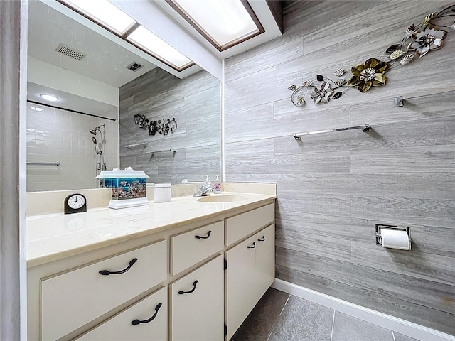 2139 Sea Pines Ct, Spring Hill, FL 34606 - full bathroom with vanity, wood walls, and tile patterned floors