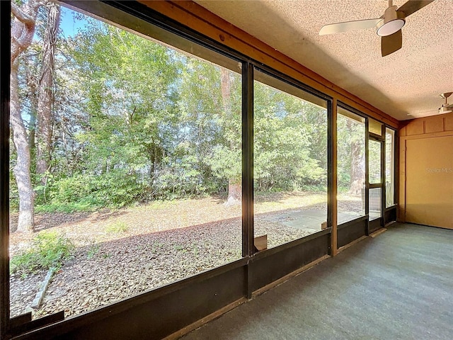 2139 Sea Pines Ct, Spring Hill, FL 34606 - unfurnished sunroom with a ceiling fan
