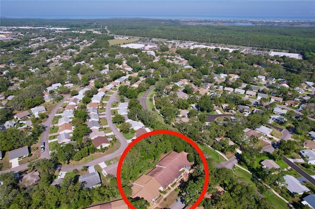 2139 Sea Pines Ct, Spring Hill, FL 34606 - aerial view of property's location with a heavily wooded area and nearby suburban area