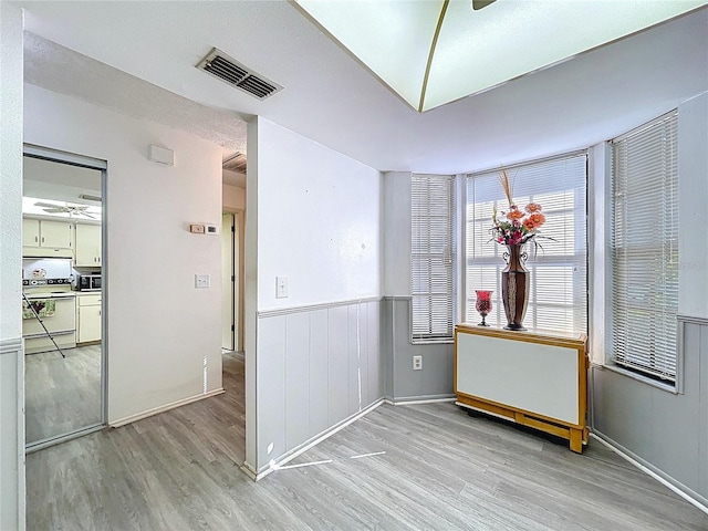 2139 Sea Pines Ct, Spring Hill, FL 34606 - empty room with light wood-style floors and baseboards