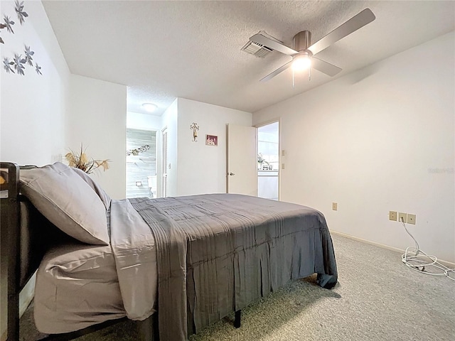 2139 Sea Pines Ct, Spring Hill, FL 34606 - bedroom featuring carpet, a textured ceiling, baseboards, and a ceiling fan