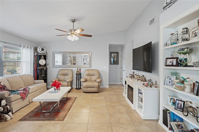 6315 Shane Ln, New Port Richey, FL 34653 - tiled living area with a ceiling fan